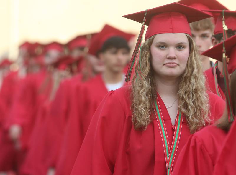 La Salle-Peru Township High School student Makenzie Hamilton enters in the procession during the 126th annual commencement graduation ceremony on Thursday, May 16, 2024 in Howard Fellows Stadium.