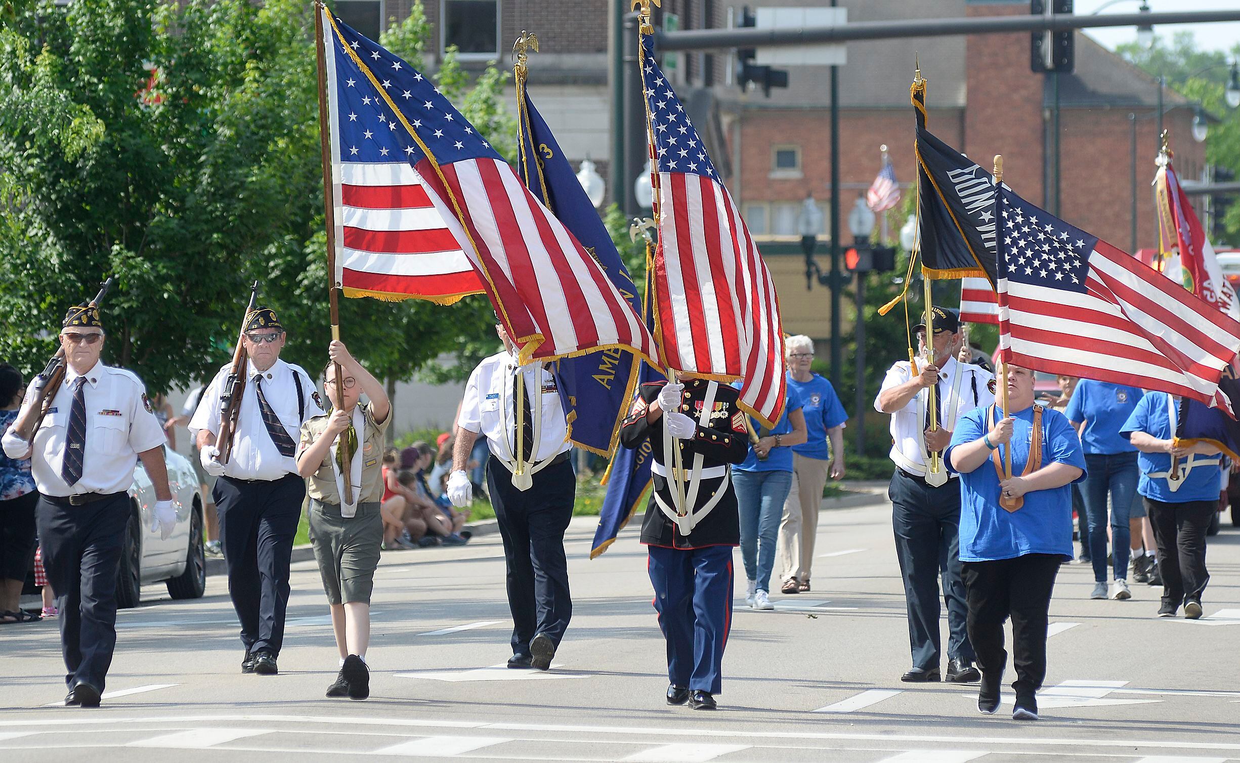 Local veterans groups and Scouts march in 2022 down Columbus Street in Ottawa during the annual Memorial Day parade.