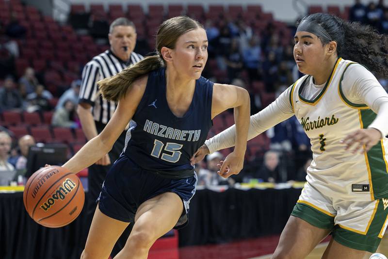 Nazareth Academy’s Mary Bridget Wilson works against Waubonsie Valley’s Arianna Garcia Friday, March 1, 2024 in the girls basketball 4A state semifinal at CEFCU Arena in Normal.