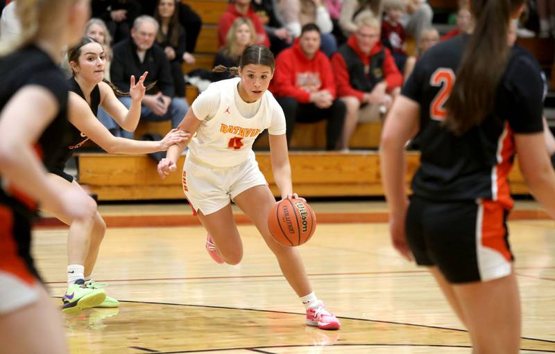 Batavia’s Addi Lowe drives toward the basket during a Class 4A Batavia Sectional semifinal game against St. Charles East on Tuesday, Feb. 20, 2024.