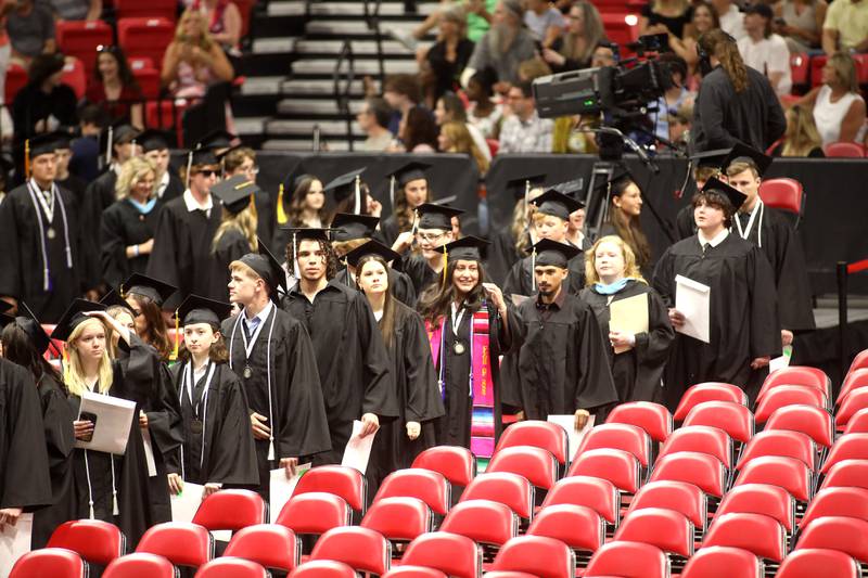 Kaneland High School graduates enter the stadium during the school’s 2024 Commencement Ceremony at Northern Illinois University in DeKalb on Sunday, May 19, 2024.