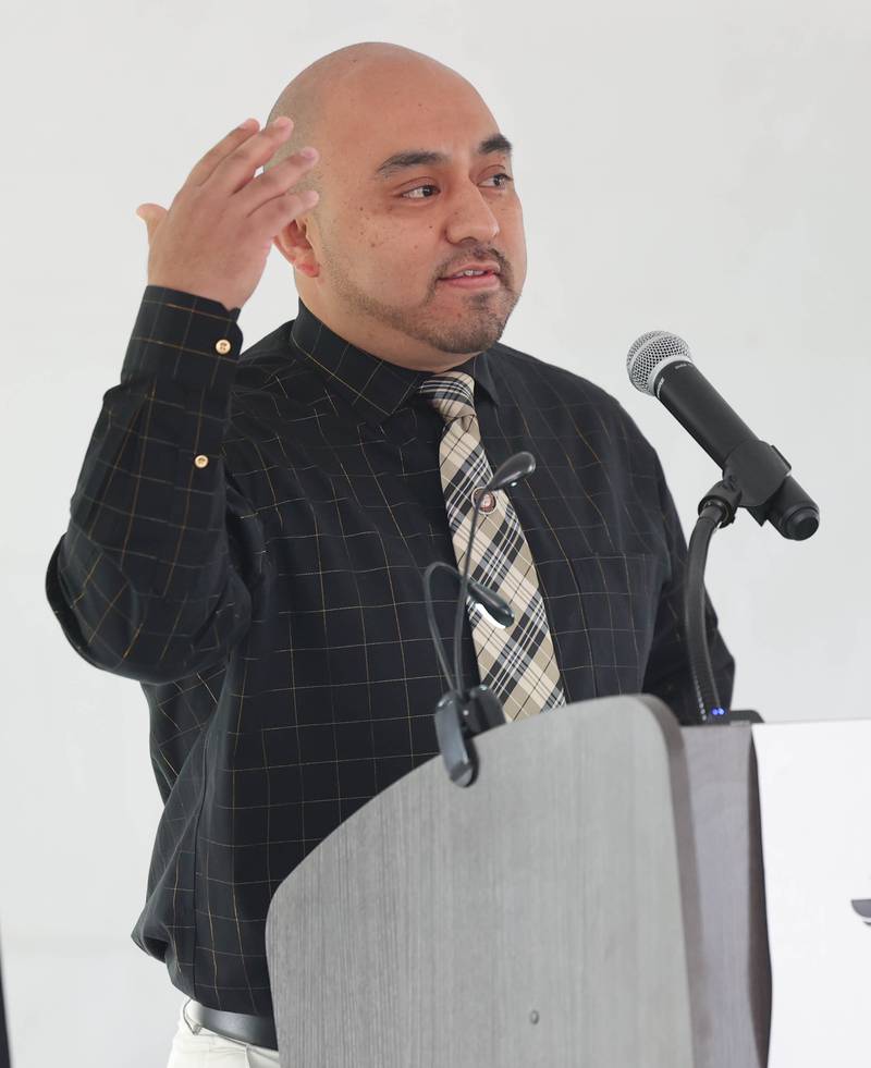 Billy Hueramo, District 428 director of teaching and learning for primary education, speaks Thursday, April 11, 2024, during the groundbreaking ceremony for Dr. Leroy A. Mitchell Elementary School. The school will be located at 1240 Normal Road in DeKalb.
