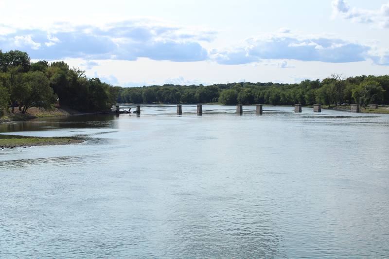 Support bases from a former railroad bridge that spanned the Rock River in Dixon are seen in a photo from Sept. 9, 2021. A planned bike trail connector approximate to that location is the subject of a $12 million grant for the project.