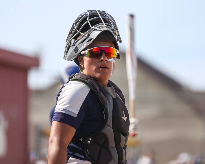 Oswego's Kiyah Chavez (10) looks for the sign from the dugout during Class 4A Plainfield North Sectional final softball game between Wheaton North at Oswego. May 31th, 2024.