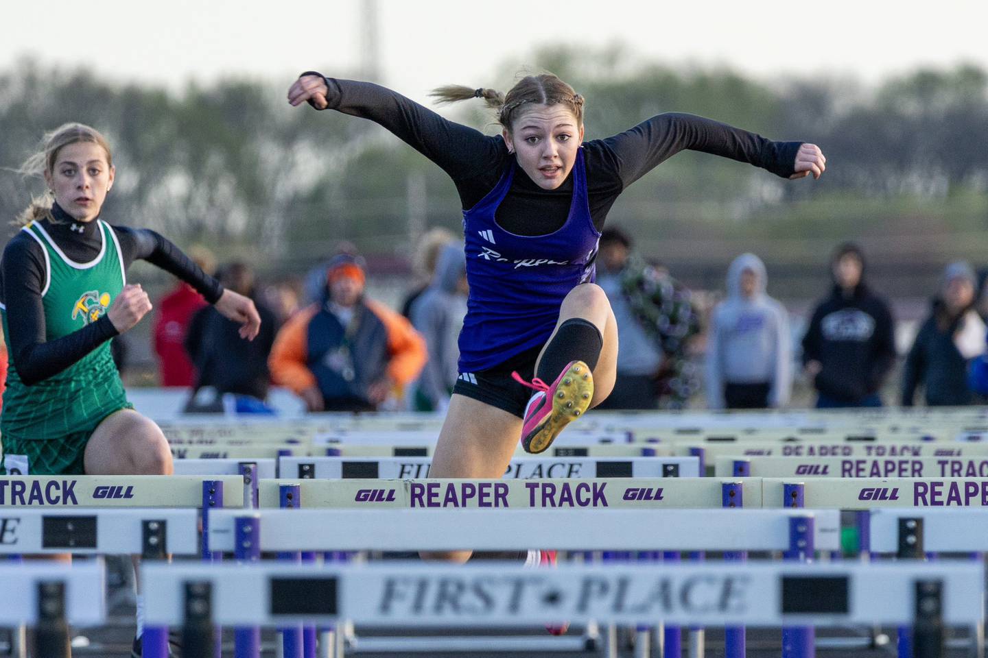 Plano's Kaylee Klatt competes in the hurdles race during the Field of Dreams Invitational on Friday, April 19, 2024 in Plano.