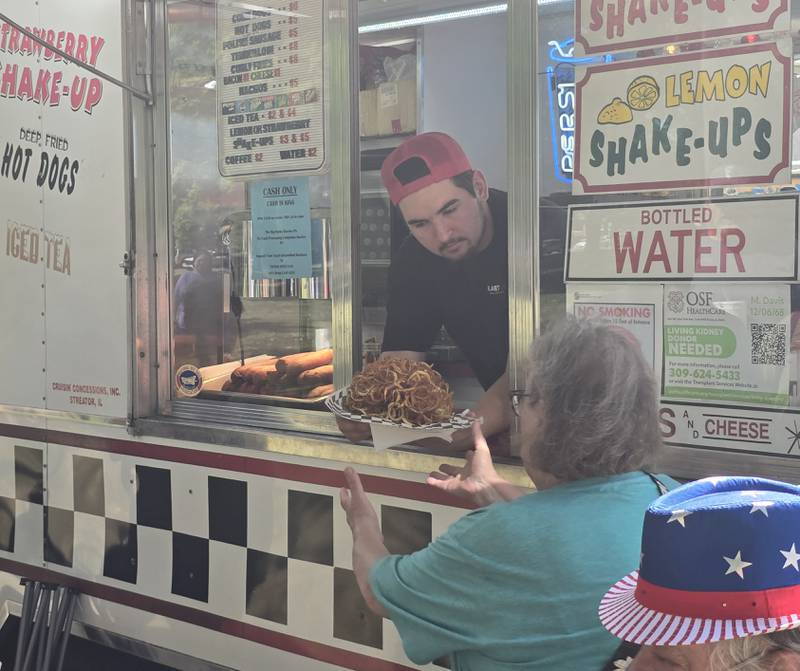 An order of curly fries is served Saturday, Sept. 14, 2024, from Streator's own Cruisin Concession during the Fall Food Truck Festival at City Park.