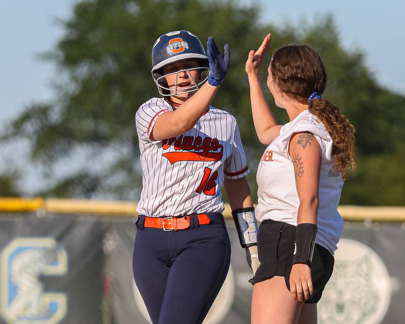 Oswego's Rikka Ludvigson (16) celebrates after beating the throw to first during Class 4A Plainfield North Sectional semifinal softball game between Wheaton-Warrenville South at Oswego. May 29th, 2024.