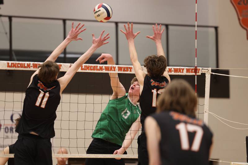 Providence’s Sean Dovin his a high shot against Lincoln-Way West on Wednesday, April 3, 2024 in New Lenox.