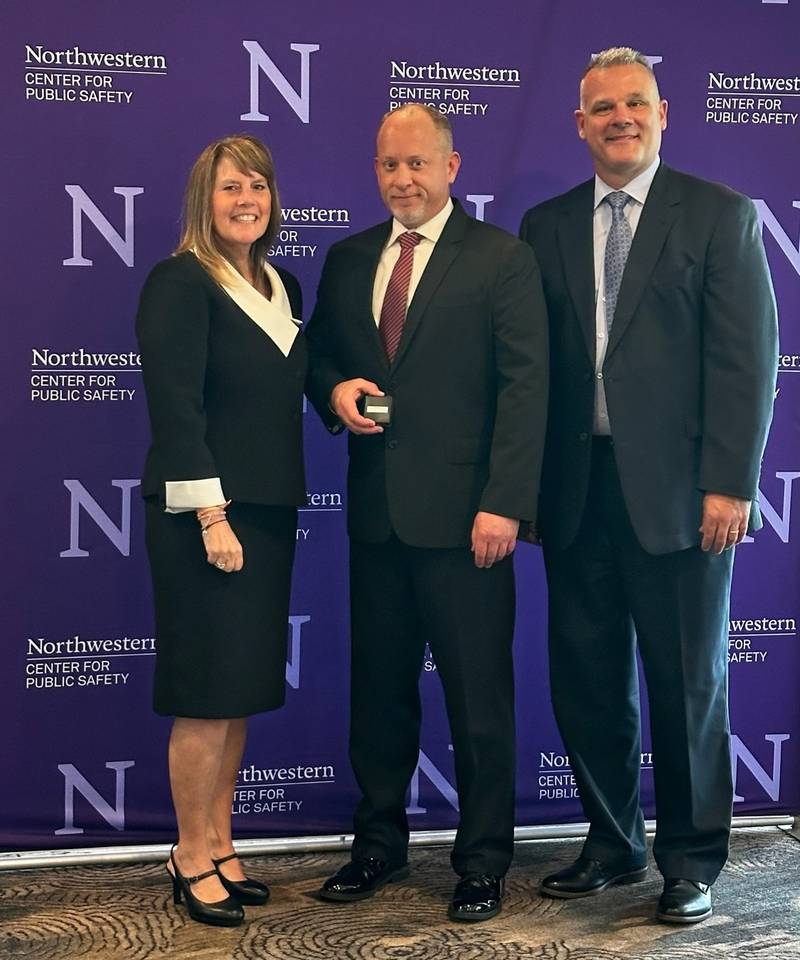 Campton Hills Police Chief James Levand (center) graduated May 3 from the Northwestern University School of Police Staff and Command. Levand is flanked by Deputy Director of Northwestern Center for Public Safety Shelley Camden (right) and St. Charles Police Chief James Keegan (left). Keegan and the St. Charles Police Department hosted the 10-week program.