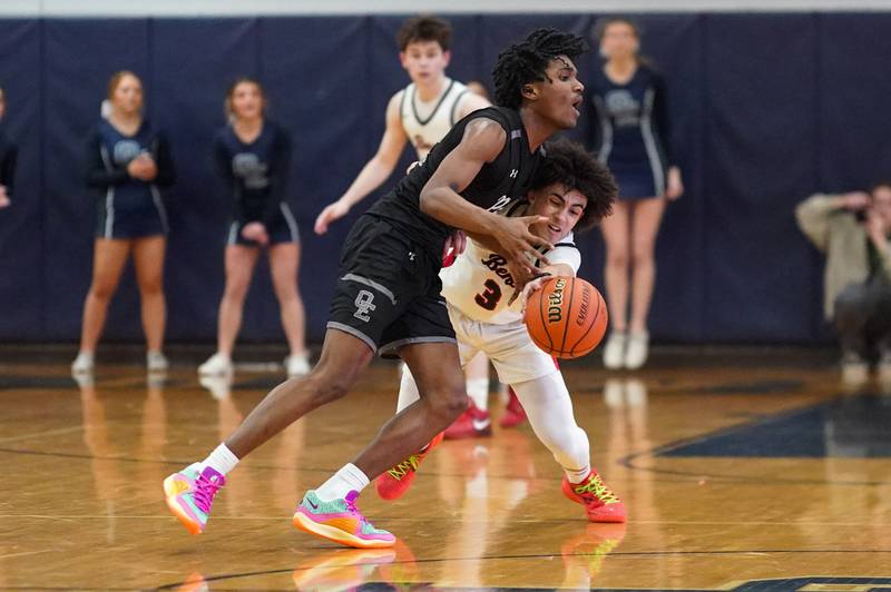 Benet’s Jayden Wright (3) fouls Oswego East's Jehvion Starwood (22) late in the fourth quarter of play during a Class 4A Oswego East regional final basketball game at Oswego East High School on Friday, Feb 23, 2024.
