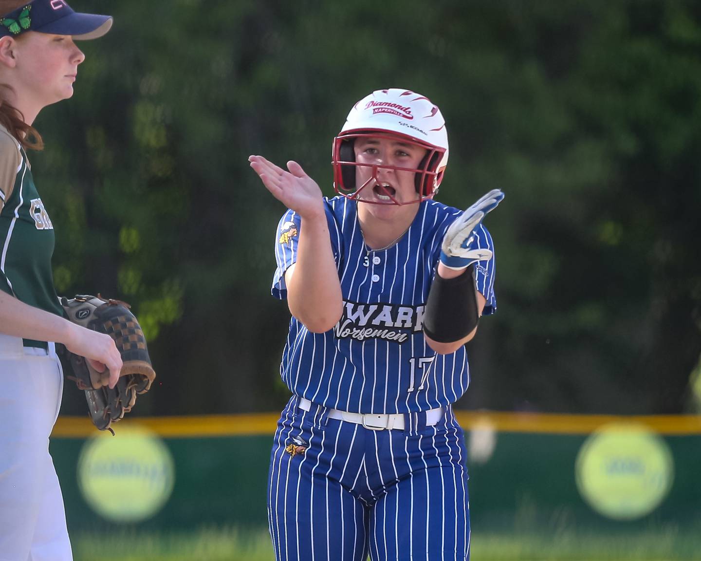 Newark's Danica Peshia (17) claps after advancing to third during Class 1A Newark Regional final game between St. Edwards at Newark. May 17th, 2024.