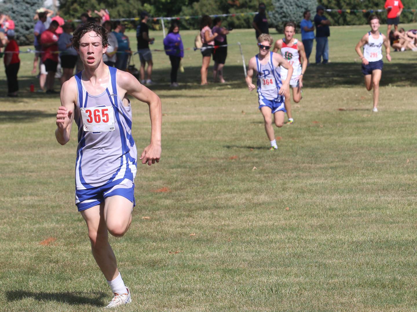 Princeton's Tyler VandeVenter finishes with teammate Augustus Swanson trailing behind in the Gary Coates Cross Country Invitational on Saturday, Sept. 14, 2024 Zearing Park in Princeton.