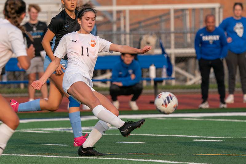 Wheaton Warrenville South's Ella Byrnes (11) plays the ball against St. Charles North during the Class 3A girls soccer regional final at St. Charles North High School on Friday, May 19, 2023.