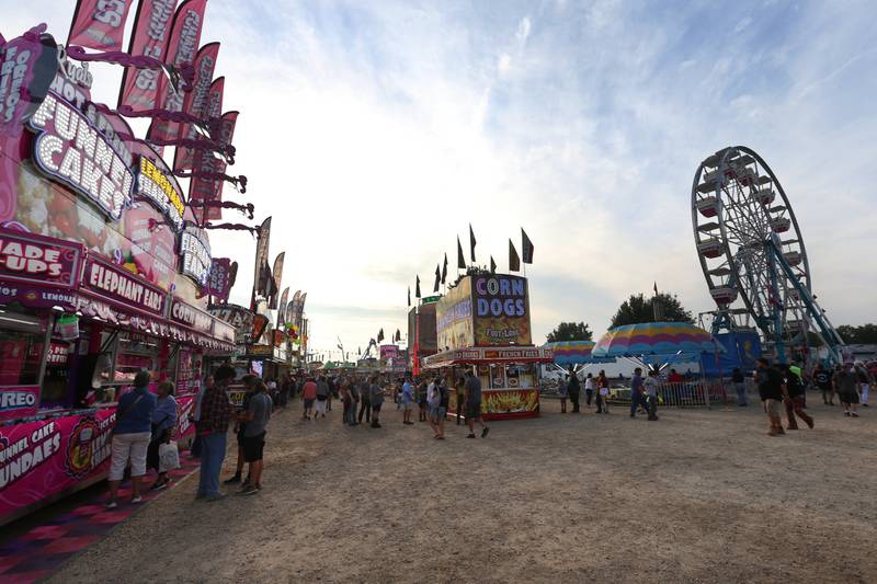 A large carnival midway welcomes visitors to the 169th Bureau County Fair on Thursday, Aug. 22, 2024 in Princeton.