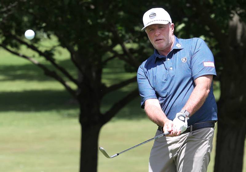 David Paeglow, head golf pro at Kishwaukee Country Club, chips onto the 18th green Thursday, June 6, 2024, at the country club in DeKalb. Paeglow will be competing in the U.S. Senior Open later this month.