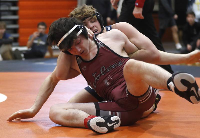 Yorkville Christian’s Robby Nelson controls Prairie Ridge’s Xander York during the 157-pound championship match of a the IHSA 2A Crystal Lake Central Wrestling Regional on Saturday, Feb. 3, 2024, at Crystal Lake Central High School.