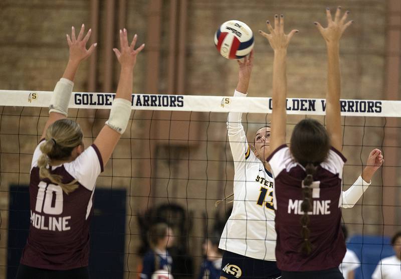 Sterling’s Marley Sechrest plays the ball over the net Tuesday, Sept. 10, 2024, against Moline.