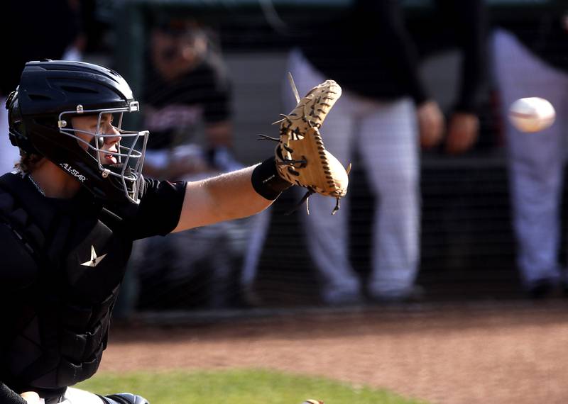 Crystal Lake Central's Sean Kempf catches a pitch during a Class 3A Grayslake Central sectional championship baseball game against Deerfield on Friday, May 31, 2024, at the Grayslake Central High School.