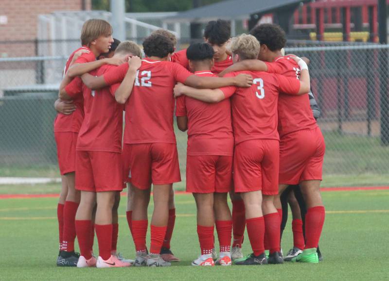 Members of the L-P soccer team huddle before playing Ottawa on Wednesday, Sept. 18, 2024 at the L-P Athletic Complex in La Salle.