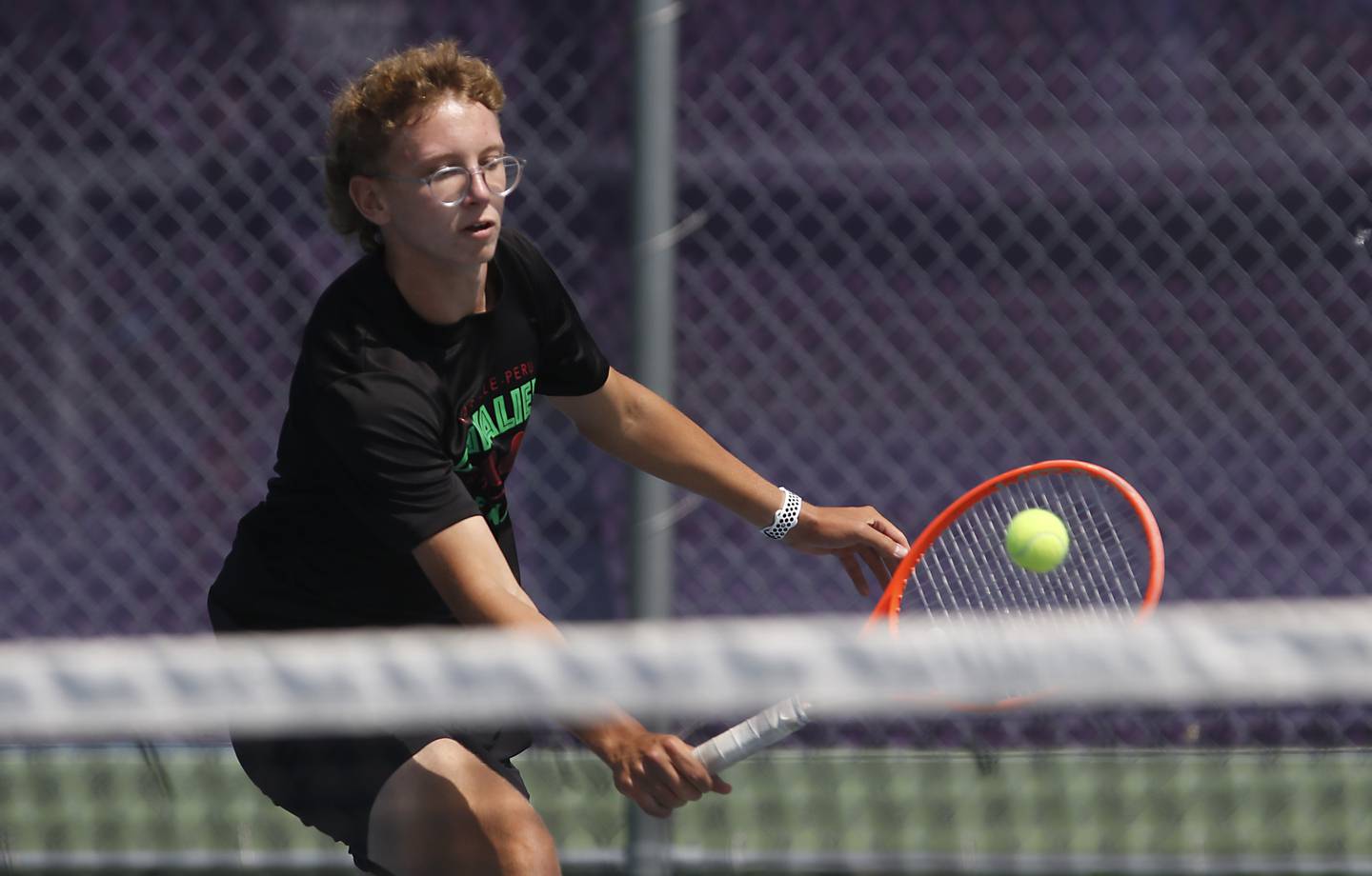 LaSalle-Peru's Andrew Bollis returns the ball as he competes in the Class 1A Boys Doubles State Tennis Tournament on Thursday, May 23, 2024, at Rolling Meadows High School in Rolling Meadows.