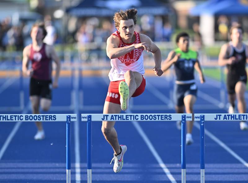 Naperville Central Bode Smith competing in the 300 meter hurdles during the IHSA 3A Sectional track meet  on Friday, May. 17, 2024, at Joliet.