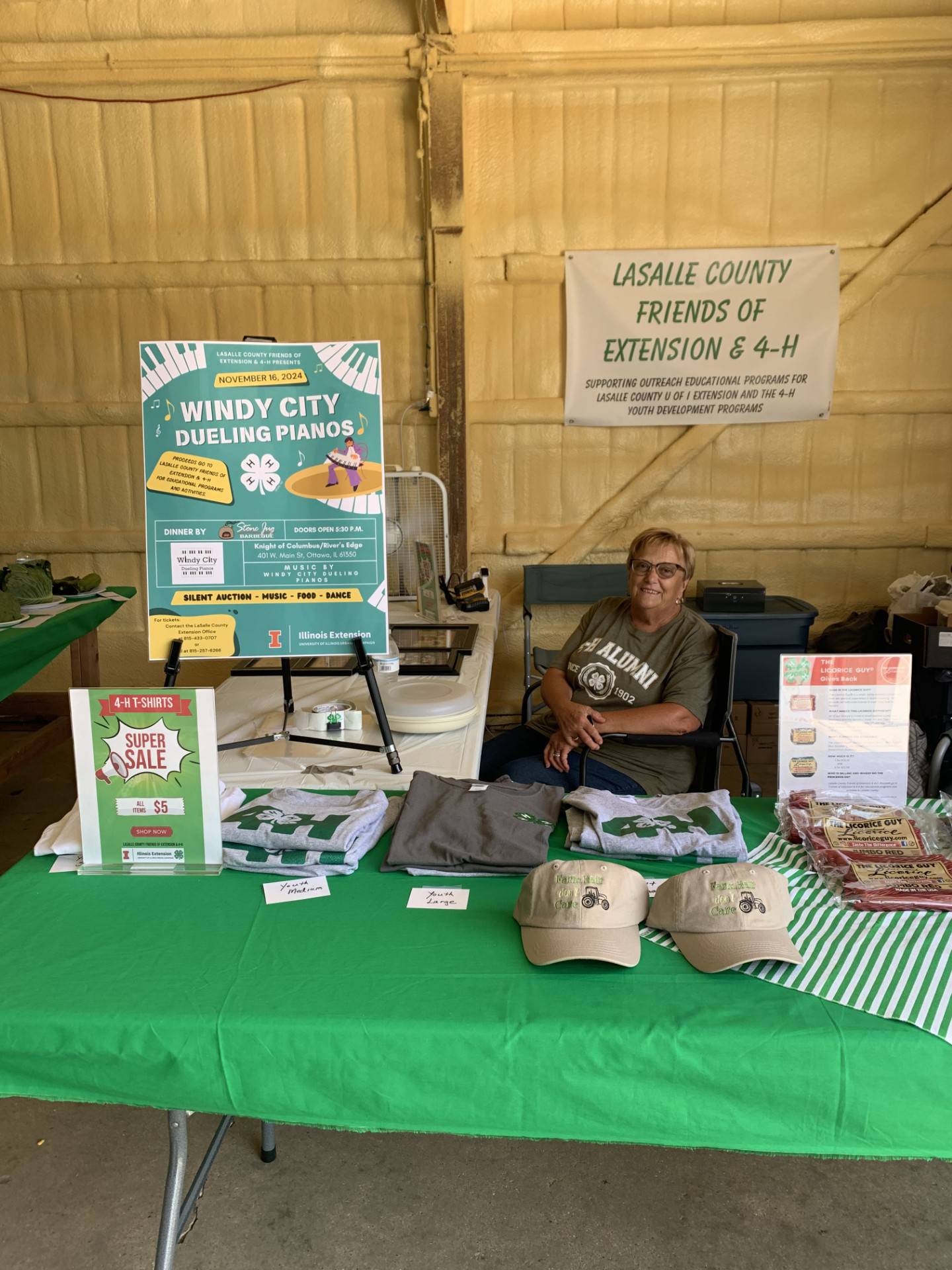 Gail Hayward, Chairman of La Salle County Friends of University of Illinois Extension & 4-H, as she sits at a fundraising booth selling 4-H merchandise and licorice with proceeds going to educational programs and activities in LaSalle County. (Bill Freskos)