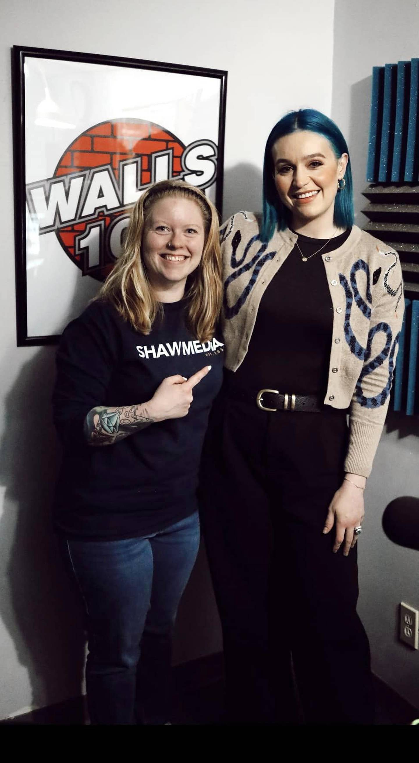 Dani Holland, morning host and program director for WALLS 102, with Amy Sheppard.