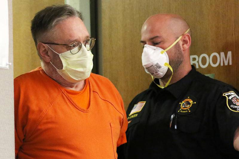 Andrew Freund appears Thursday in court for a status hearing with Judge Robert Wilbrandt at the McHenry County Courthouse in Woodstock. Freund is facing trial for the murder of his 5-year-old son AJ Freund and is due back in court at 9 a.m. Aug. 28.
