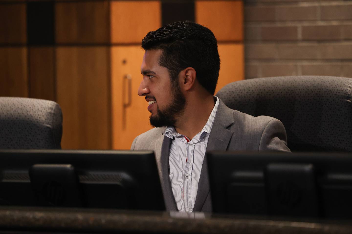 Councilman Cesar Guerrero has a conversation before the start of the Joliet City Council meeting on Tuesday, July 18th, 2023.