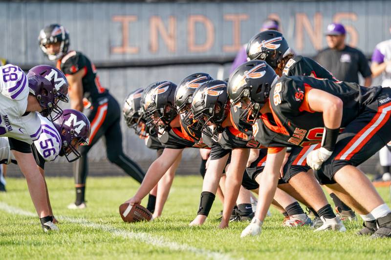 Sandwich offensive lines up against Manteno during a football game at Sandwich High School on Saturday, Aug 26, 2023.