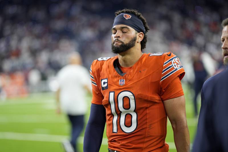 Chicago Bears quarterback Caleb Williams heads off the field following an NFL football game against the Houston Texans Sunday, Sept. 15, 2024, in Houston. The Texans won 19-13.