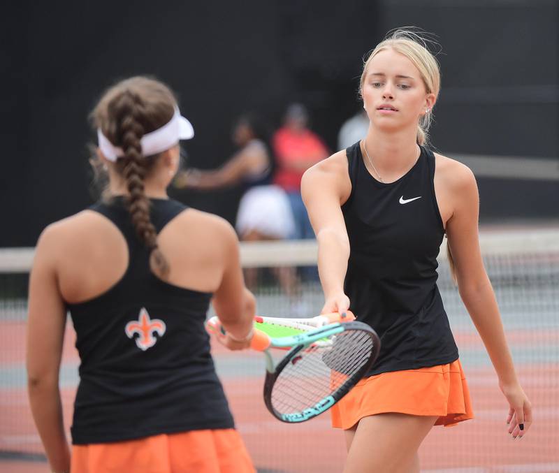 St. Charles East doubles team of Ana Avila, right, and Avary Sitarz at the DuKane Conference girls tennis tournament at Wheaton Warrenville South High School on Thursday, October 5, 2023.