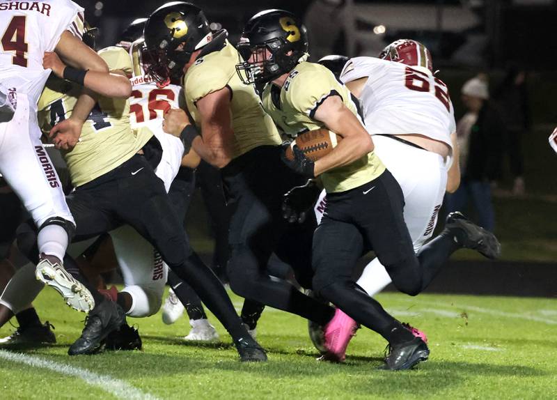 Sycamore's Kevin Lee carries the ball during their game against Morris Friday, Oct. 18, 2024, at Sycamore High School.