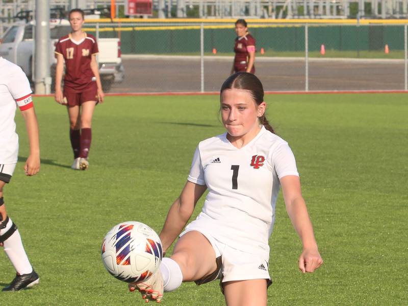 L-P's Addie Dawson boots the ball down the field against Morris during the Class 2A Regional semifinal game on Wednesday, May 15, 2024 at the L-P Athletic Complex in La Salle.