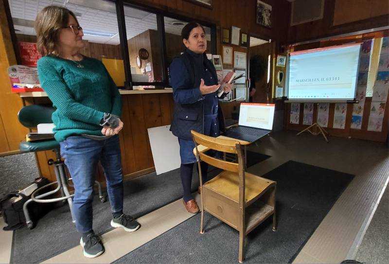 Katie Trocolli and DeAnna Carlson of the not-for-profit Here and Again make their presentation of tourism ideas to the Marseilles City Council on Wednesday night.