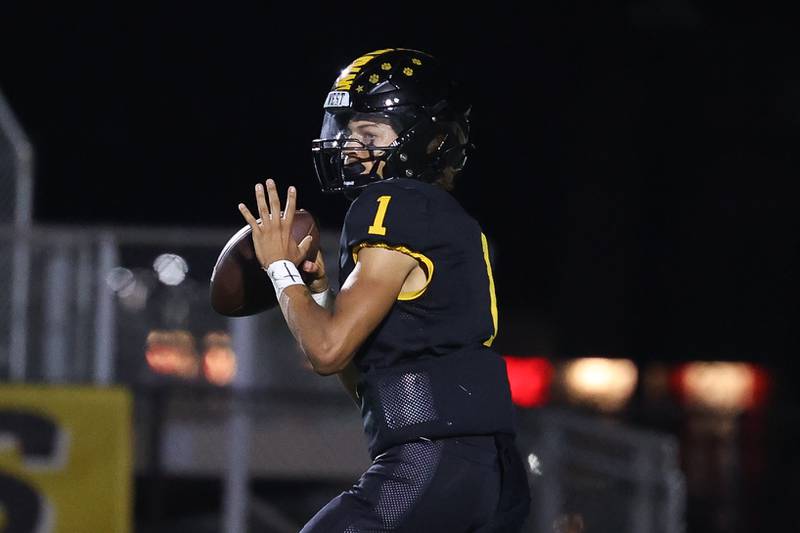 Joliet West’s Antoine Brooks looks to pass against Yorkville on Friday, Sept. 13, 2024 in Joliet.