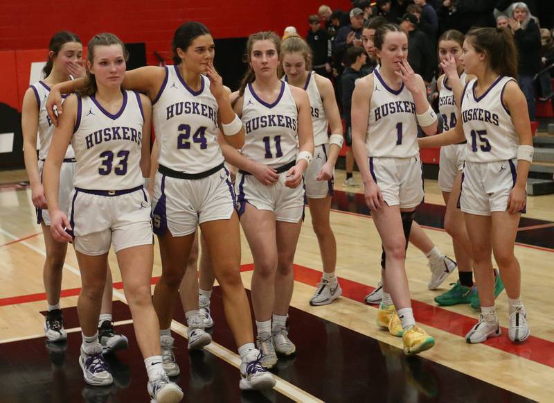 Members of the Serena girls basketball team walk off of the court after winning the Class 1A Regional over Ashton-Franklin Center on Thursday, Feb. 15, 2024 at Earlville High School.