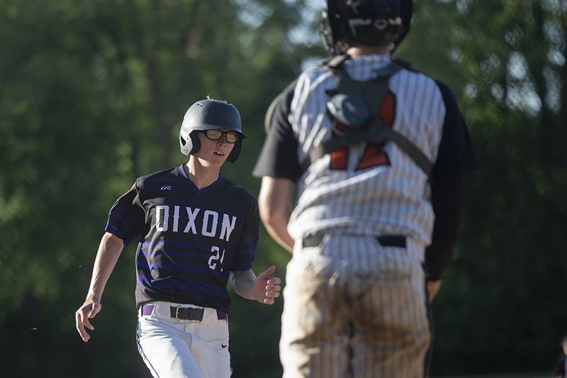 Dixon’s James Leslie comes in to score against Freeport Thursday, May 23, 2024 during the Class 3A regional semifinal in Dixon.