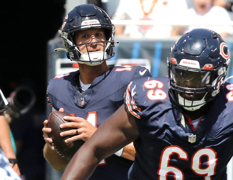 Chicago Bears quarterback Nathan Peterman looks for a receiver in the Tennessee Titans’ secondary during their preseason game against the Tennessee Titans Saturday, Aug. 12, 2023, at Soldier Field in Chicago.