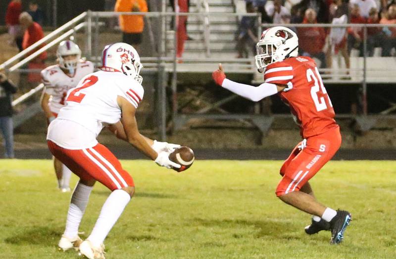 Ottawa's Andrew Vercolio catches a pass to score a touchdown as the ball bounces off Streator's Weston Averkamp on Friday, Sept. 6, 2024 at Doug Dieken Stadium.