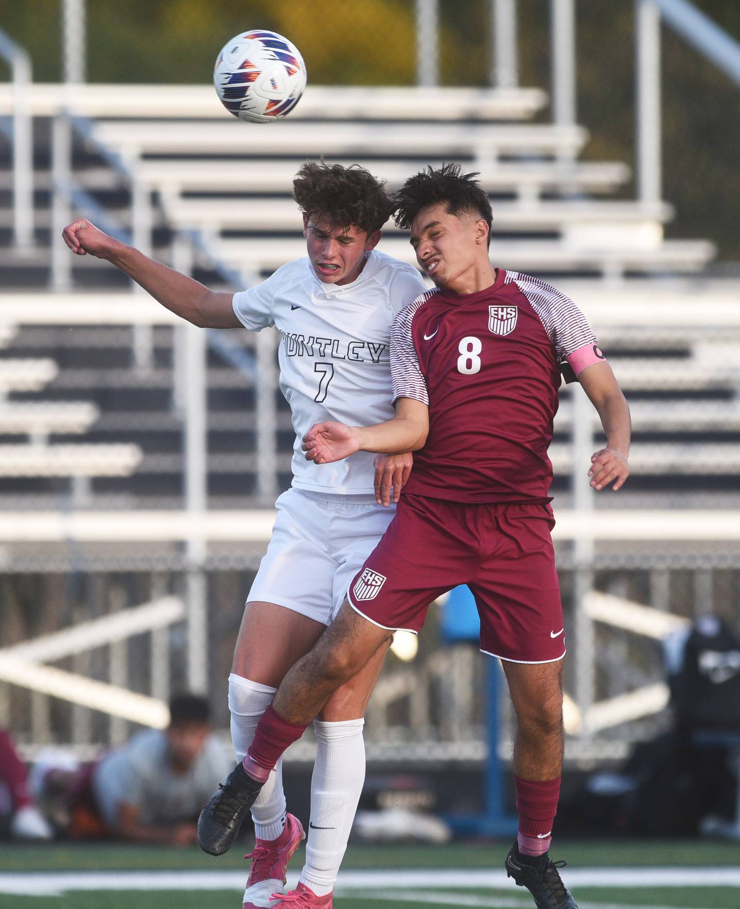 Huntley's Mason Leslie (7) and Elgin's Aaron Saldana (8) compete for the header during Tuesday’s IHSA class 3A sectional semifinal boys soccer game in Round Lake.