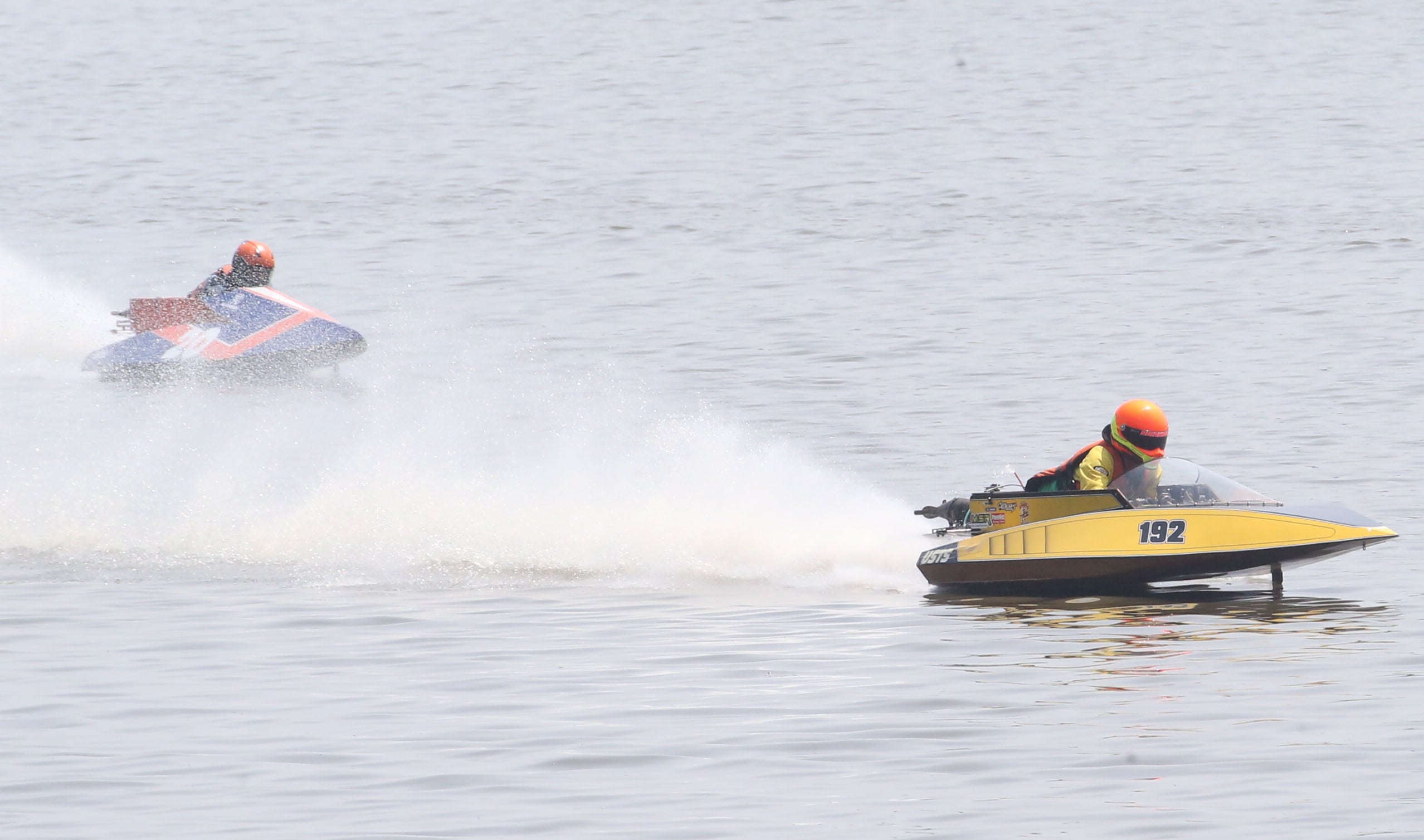 Brady Brinkman of Springfield and Ethan Fox of Elkhorn Neb. races in the 125cc Runabout during the US Title Series Pro National Championship Boat Races on Friday, July 26, 2024 at Lake DePue.