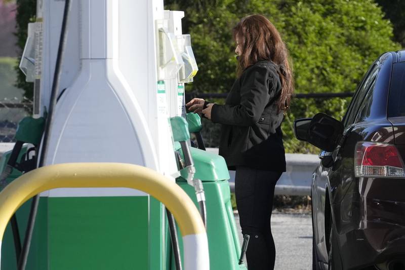 FILE - A customer prepares to purchase gas at a filling station in Chicago, Monday, April 22, 2024. On Wednesday, May 15, 2024, the Labor Department issues its report on inflation at the consumer level in April. (AP Photo/Nam Y. Huh, File)