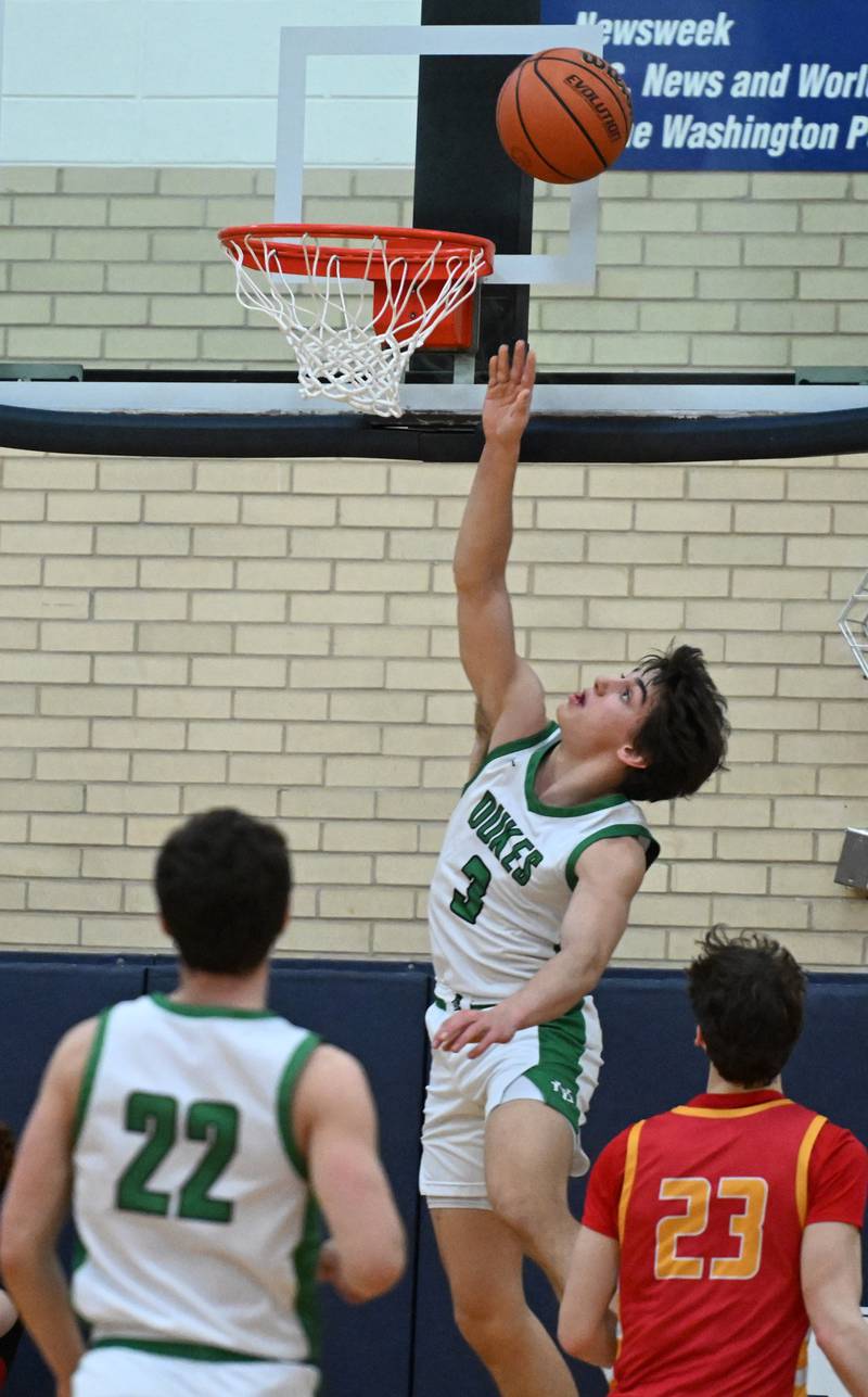 York’s A.J. Levine drives to the basket for a layup against Batavia during the Addison Trail Class 4A boys basketball sectional semifinal on Wednesday, Feb. 28, 2024 in Addison.