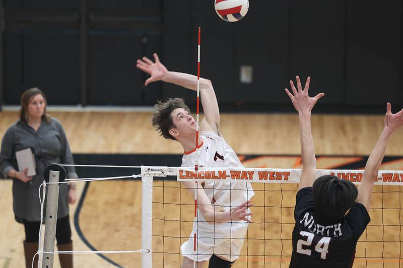 Lincoln-Way West’s Colin Dargan goes up for the kill against Plainfield North on Monday, March 18, 2024 in New Lenox.