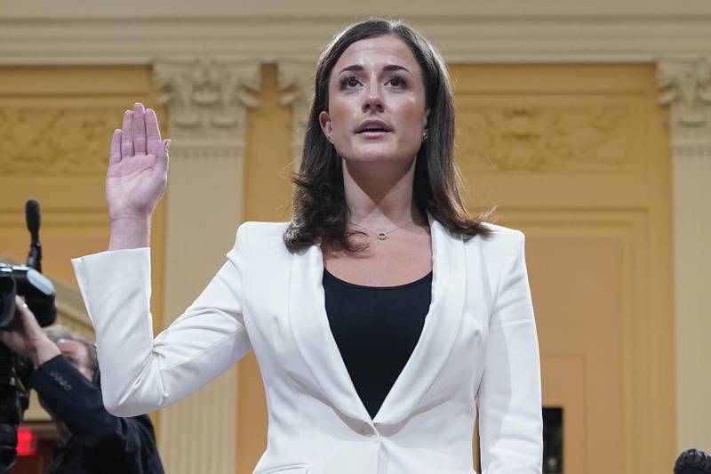 FILE - Cassidy Hutchinson, former aide to Trump White House chief of staff Mark Meadows, is sworn in to testify before the House select committee investigating the Jan. 6 attack, on Capitol Hill in Washington, June 28, 2022. Hutchinson has told the House Jan. 6 committee that her first lawyer advised her against being fully forthcoming with the panel, telling her, “the less you remember, the better.” That's according to a transcript of one of her interviews released Thursday.  (AP Photo/Jacquelyn Martin, File)