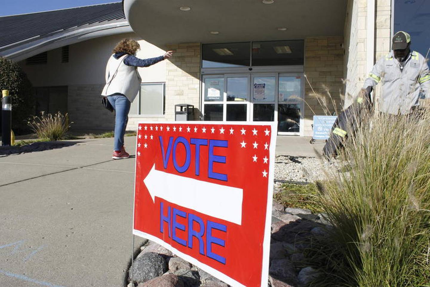 A voter walks into the Joliet Public Library on Election Day.