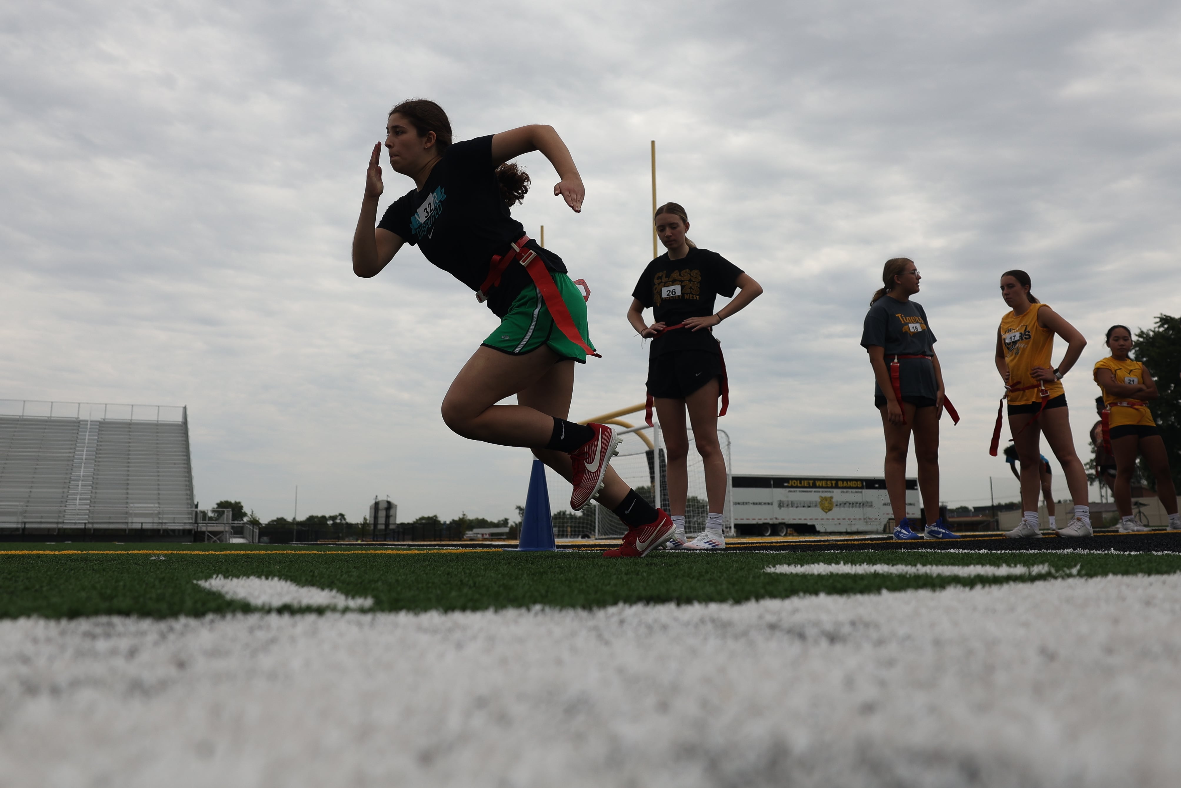 Over 60 girls showed up for the first day of a two-day tryouts for the Joliet West girls flag football on Monday, Aug. 12, 2024  at Joliet West High School.