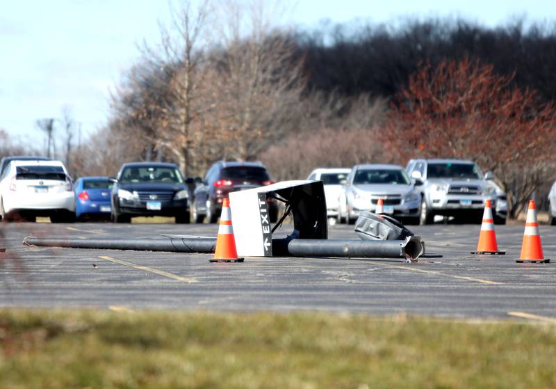 Trees, signs and fences were damaged on the Waubonsee Community College campus in Sugar Grove on Wednesday, Feb. 28, 2024 following a reported tornado the night before.