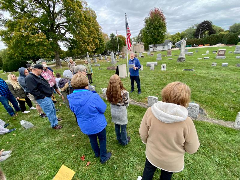 Stephen Haight, member of the Sons of Union Veterans of the Civil War,  speaks at the DeKalb County History Center’s annual Etched in Stone Cemetery Walk at Elmwood Cemetery, 901 S. Cross St., Sycamore on Sunday, Oct. 8, 2023. Haight presented information on three Sycamore Civil War veterans.